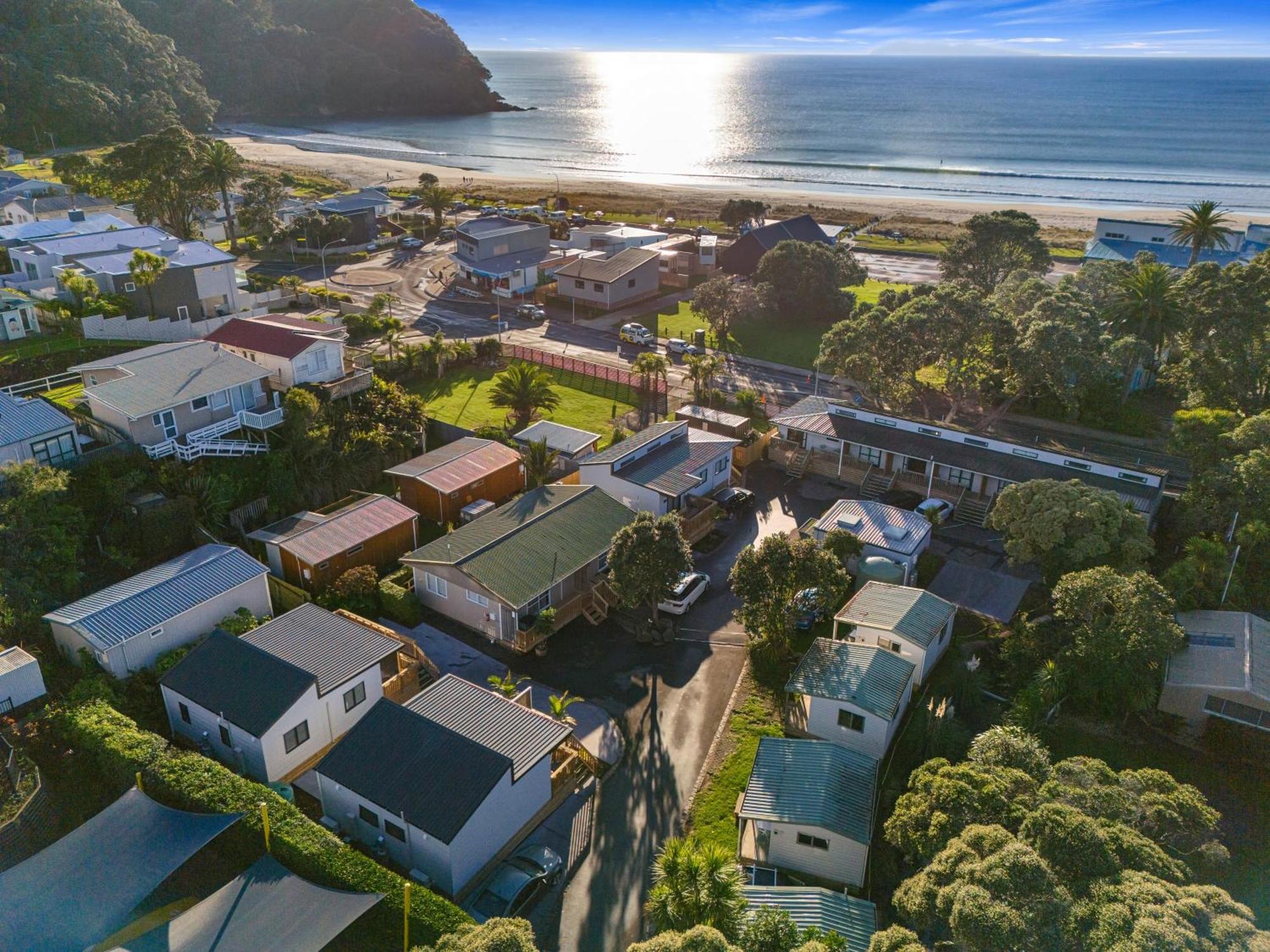 Tasman Holiday Parks - Waihi Beach Exterior photo Aerial view of the town