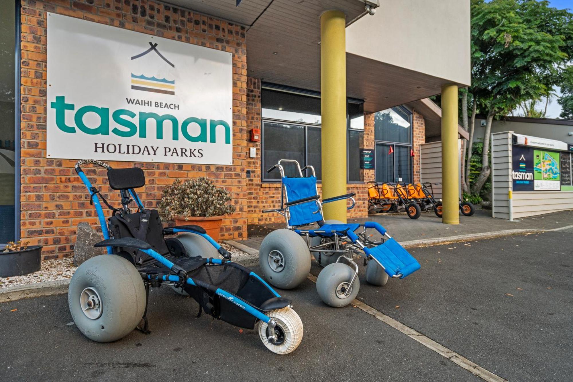 Tasman Holiday Parks - Waihi Beach Exterior photo Beach wheelchairs at a holiday park